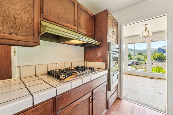 Interior, Kitchen, Tile Countertops, Wood Texture Flooring