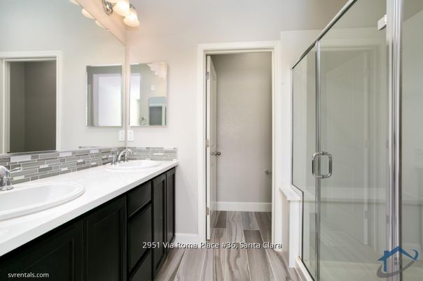 Bathroom, Dual Sink Vanities, Glass Shower, Interior, Wood Texture Flooring