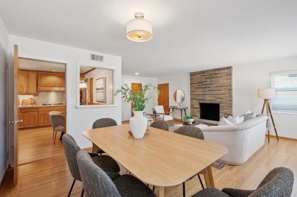 Dining room, Fireplace, Interior, Kitchen, Living room, Recessed Lighting, Stone Walls, Wood Texture Flooring