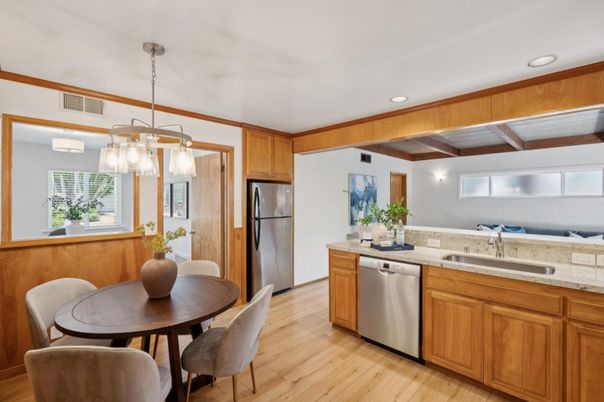 Dining room, Interior, Kitchen, Pendant Lights, Recessed Lighting, Stainless Steel Appliances, Wood Texture Flooring