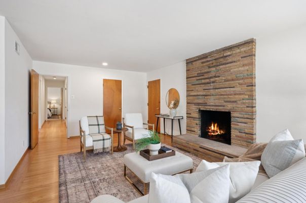 Fireplace, Interior, Living room, Recessed Lighting, Stone Walls, Wood Texture Flooring, Wooden Walls