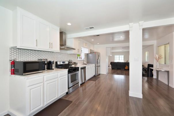 Interior, Kitchen, Recessed Lighting, Stainless Steel Appliances, Wood Texture Flooring