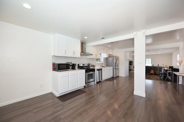 Interior, Kitchen, Recessed Lighting, Stainless Steel Appliances, Wood Texture Flooring