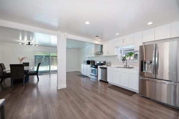 Dining room, Interior, Kitchen, Recessed Lighting, Stainless Steel Appliances, Wood Texture Flooring