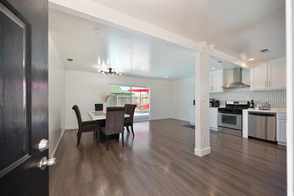 Dining room, Interior, Kitchen, Recessed Lighting, Stainless Steel Appliances, Wood Texture Flooring