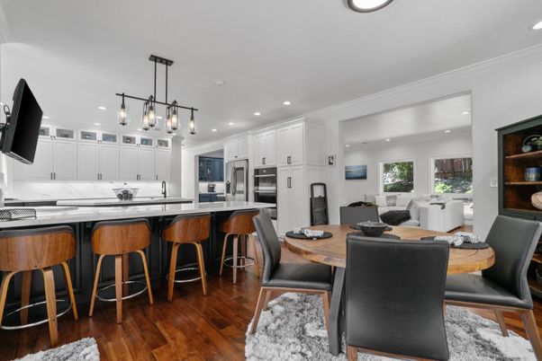 Dining room, Interior, Kitchen, Pendant Lights, Recessed Lighting, Stainless Steel Appliances, Wood Texture Flooring