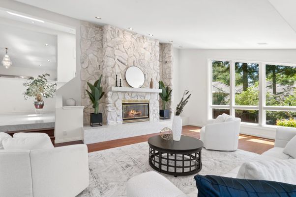 Fireplace, Interior, Living room, Marble, Pendant Lights, Recessed Lighting, Stone Walls, Wood Texture Flooring
