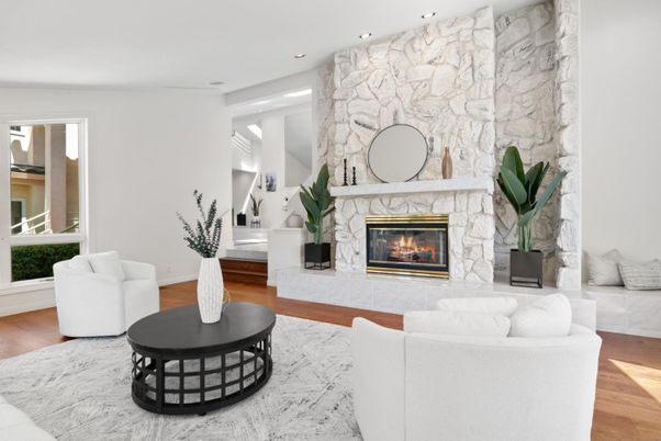 Fireplace, Interior, Living room, Recessed Lighting, Stone Walls, Wood Texture Flooring