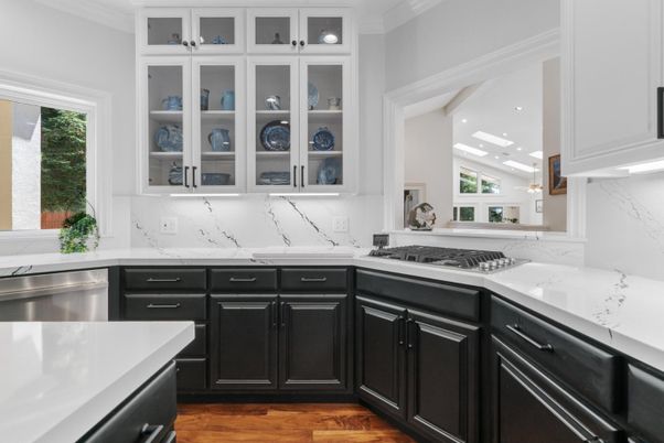 Interior, Kitchen, Marble Walls, Recessed Lighting, Stainless Steel Appliances, Wood Texture Flooring