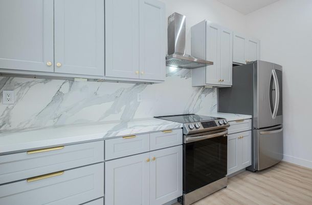 Interior, Kitchen, Marble Walls, Stainless Steel Appliances, Wood Texture Flooring