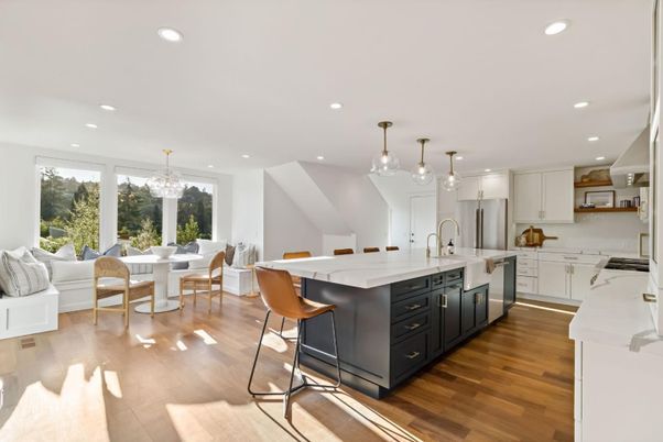 Chandelier, Dining room, Interior, Kitchen, Living room, Pendant Lights, Recessed Lighting, Stainless Steel Appliances, Wood Texture Flooring