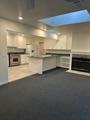 Fireplace, Interior, Kitchen, Recessed Lighting, Stainless Steel Appliances