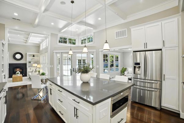 Fireplace, Interior, Kitchen, Living room, Pendant Lights, Recessed Lighting, Stainless Steel Appliances, Wood Texture Flooring