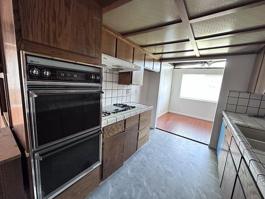 Interior, Kitchen, Tile Countertops, Wood Texture Flooring