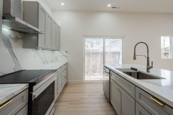 Interior, Kitchen, Recessed Lighting, Stainless Steel Appliances, Wood Texture Flooring