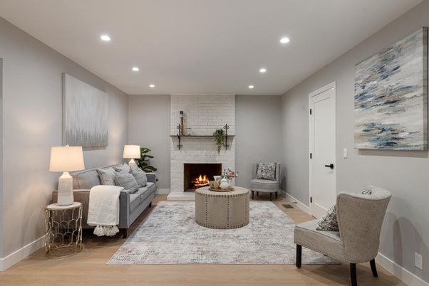 Fireplace, Interior, Living room, Recessed Lighting, Stone Walls, Wood Texture Flooring