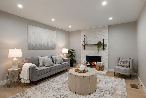 Fireplace, Interior, Living room, Recessed Lighting, Stone Walls, Wood Texture Flooring
