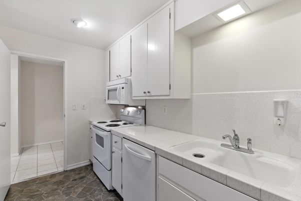 Interior, Kitchen, Recessed Lighting, Tile Countertops