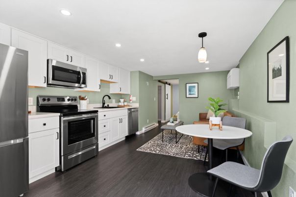 Dining room, Interior, Kitchen, Pendant Lights, Recessed Lighting, Stainless Steel Appliances, Wood Texture Flooring