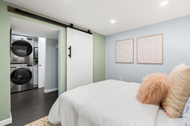 Bedroom, Interior, Recessed Lighting, Utility Closets, Washer, Wood Texture Flooring
