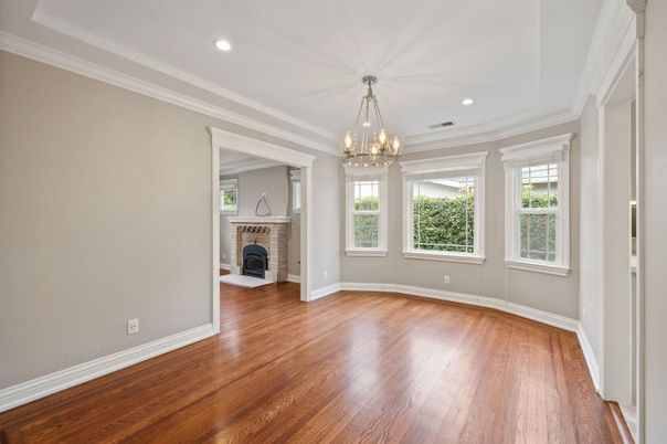 Chandelier, Empty room, Fireplace, Interior, Recessed Lighting, Washer, Wood Texture Flooring