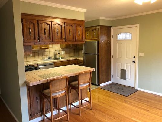 Interior, Kitchen, Tile Countertops, Wood Texture Flooring