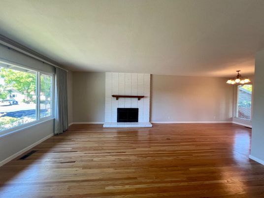 Chandelier, Empty room, Fireplace, Interior, Wood Texture Flooring