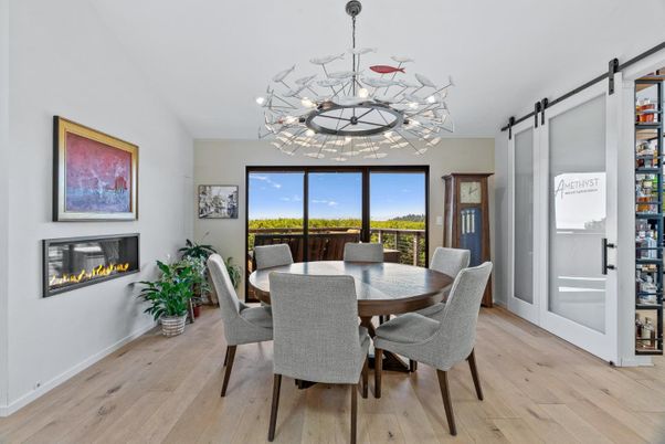 Dining room, Fireplace, Interior, Pendant Lights, Wood Texture Flooring