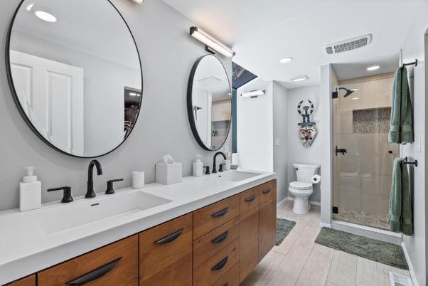 Bathroom, Dual Sink Vanities, Glass Shower, Interior, Recessed Lighting, Wood Texture Flooring