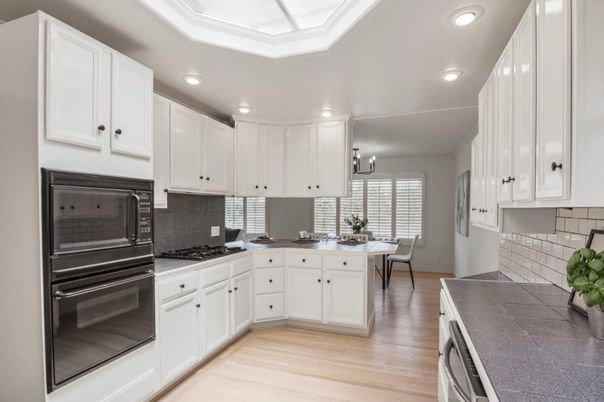 Dining room, Interior, Kitchen, Recessed Lighting, Tile Countertops, Wood Texture Flooring