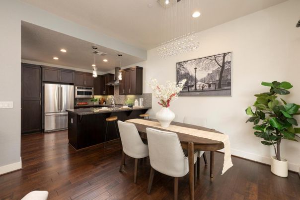 Dining room, Interior, Kitchen, Pendant Lights, Recessed Lighting, Stainless Steel Appliances, Wood Texture Flooring