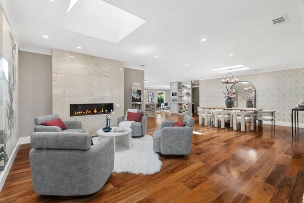 Chandelier, Dining room, Fireplace, Interior, Living room, Pendant Lights, Recessed Lighting, Wood Texture Flooring