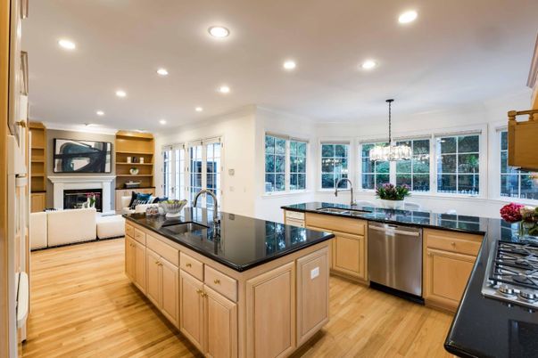 Dining room, Fireplace, Interior, Kitchen, Living room, Pendant Lights, Recessed Lighting, Stainless Steel Appliances, Wood Texture Flooring