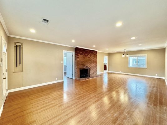 Empty room, Fireplace, Interior, Pendant Lights, Recessed Lighting, Stone Walls, Wood Texture Flooring