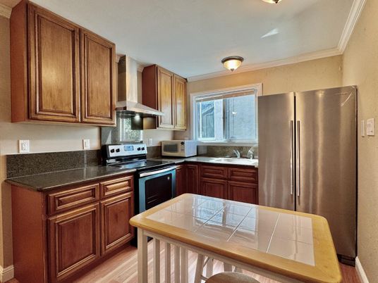 Interior, Kitchen, Tile Countertops, Wood Texture Flooring