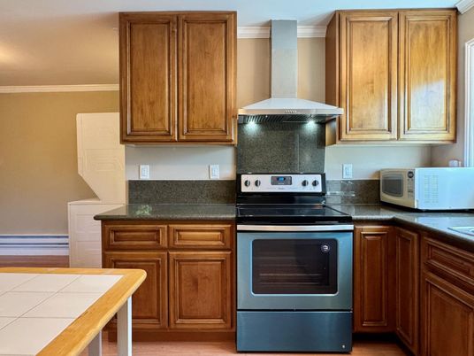 Interior, Kitchen, Tile Countertops, Wood Texture Flooring