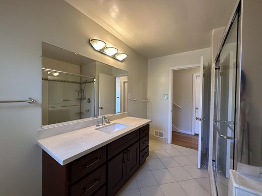 Bathroom, Dual Sink Vanities, Glass Shower, Interior, Wood Texture Flooring