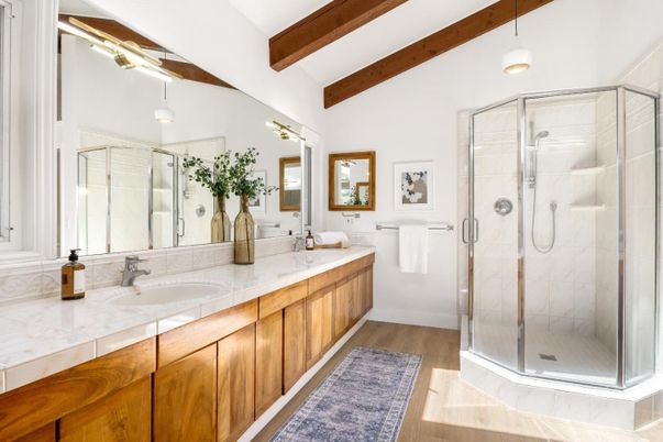 Bathroom, Dual Sink Vanities, Glass Shower, Interior, Pendant Lights, Tile Countertops, Wooden Beams, Wood Texture Flooring