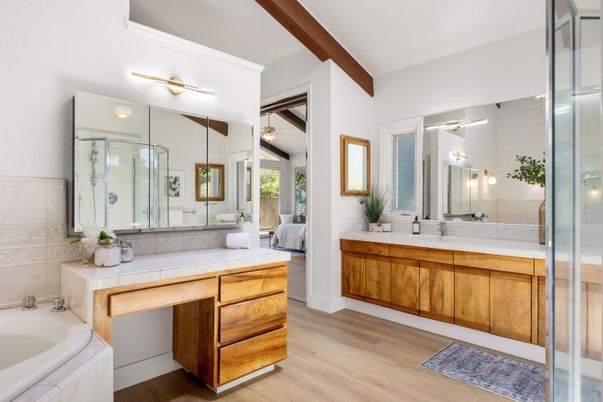 Bathroom, Bedroom, Dual Sink Vanities, Glass Shower, Interior, Tile Countertops, Wood Texture Flooring