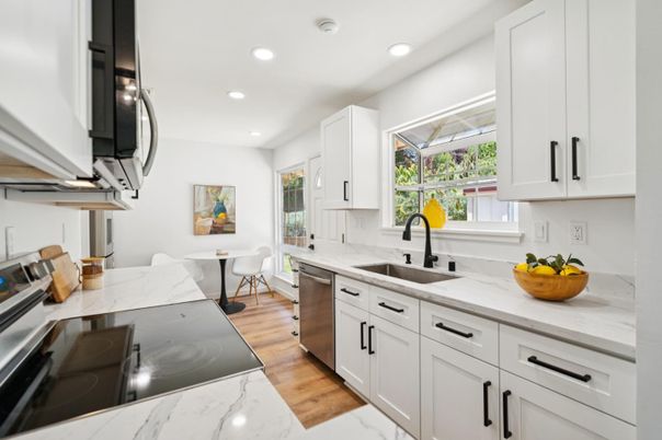 Dining room, Interior, Kitchen, Recessed Lighting, Stainless Steel Appliances, Wood Texture Flooring