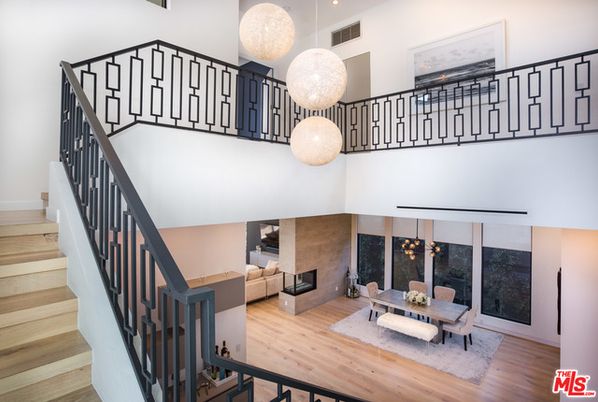 Dining room, Fireplace, Interior, Living room, Pendant Lights, Recessed Lighting, Wood Texture Flooring