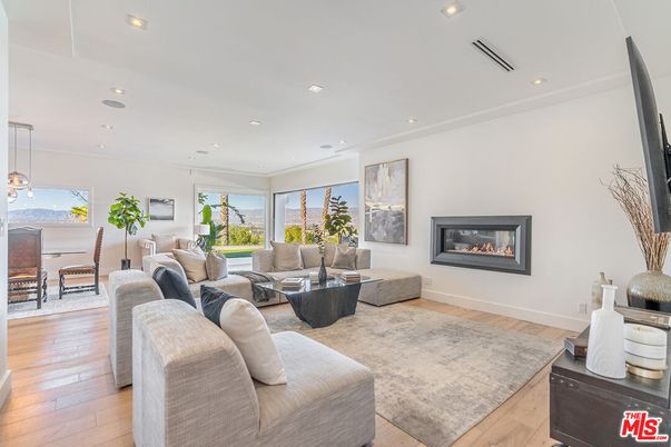 Dining room, Fireplace, Interior, Living room, Pendant Lights, Recessed Lighting, Wood Texture Flooring
