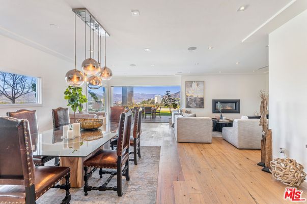 Dining room, Fireplace, Interior, Living room, Pendant Lights, Recessed Lighting, Wood Texture Flooring