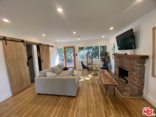 Dining room, Fireplace, Interior, Living room, Recessed Lighting, Wood Texture Flooring