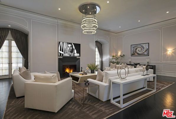 Chandelier, Fireplace, Interior, Living room, Pendant Lights, Recessed Lighting, Wood Texture Flooring