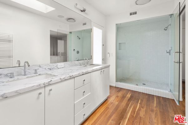 Bathroom, Dual Sink Vanities, Glass Shower, Interior, Wood Texture Flooring
