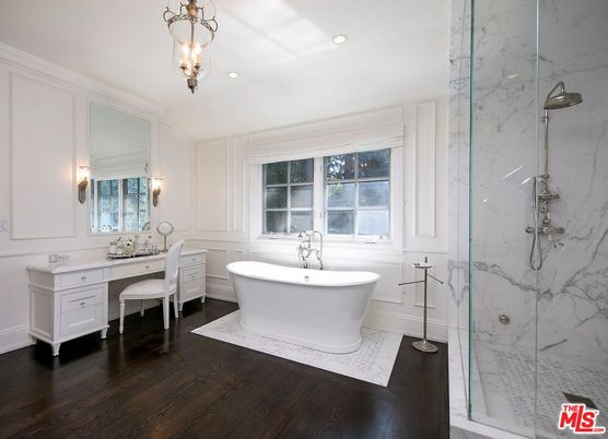 Bathroom, Dual Sink Vanities, Free Standing Baths, Glass Shower, Interior, Marble Walls, Pendant Lights, Recessed Lighting, Wood Texture Flooring