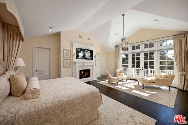 Bedroom, Chandelier, Fireplace, Interior, Recessed Lighting, Wood Texture Flooring