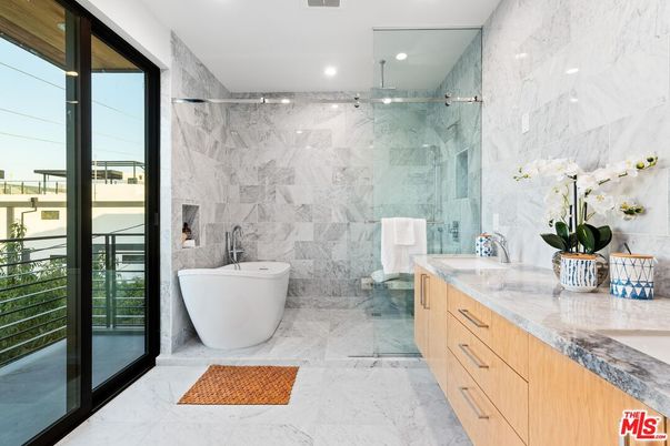 Bathroom, Dual Sink Vanities, Free Standing Baths, Glass Shower, Interior, Marble, Marble Walls, Recessed Lighting