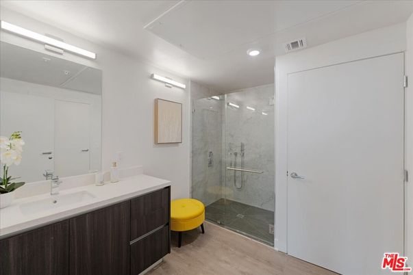 Bathroom, Glass Shower, Interior, Marble Walls, Recessed Lighting, Wood Texture Flooring